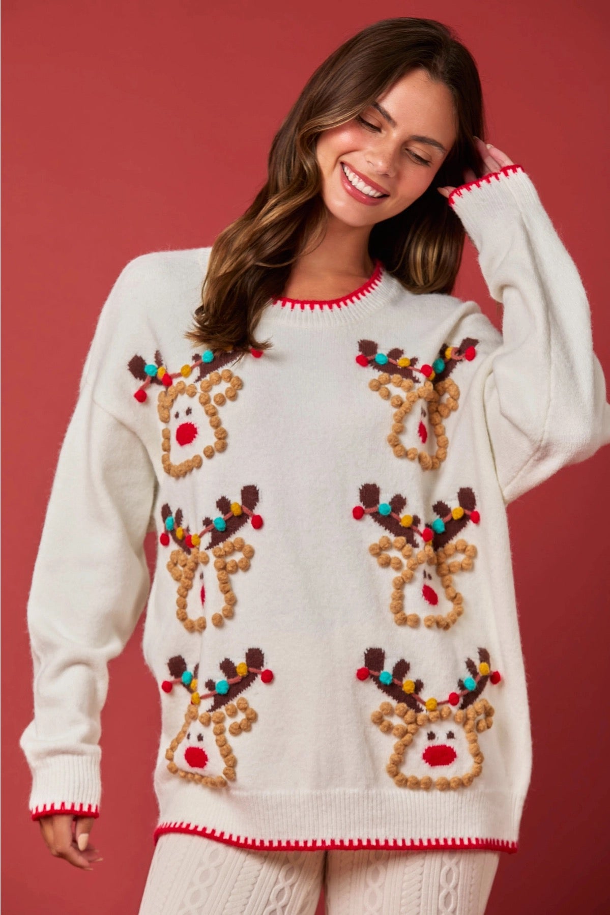 Reindeer Pom Pom Sweater